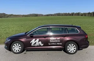 Fahrdienst Meindl VW Passat lila